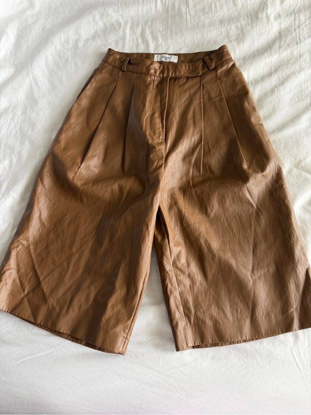 The Frankie Shop Pernille Pleated Faux Leather Shorts in Brown - Picture 3 of 16